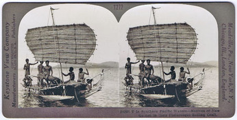New Guinea. Keystone View Company. - Stereoscope card: Natives of New Guinea in their picturesque sailing craft.